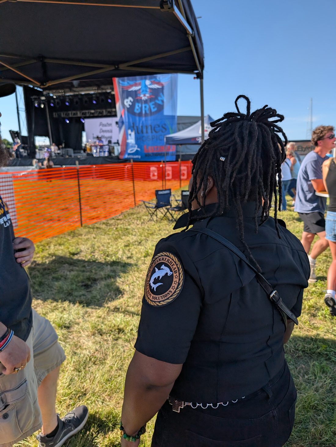 Officer patrolling a crowd at a live event